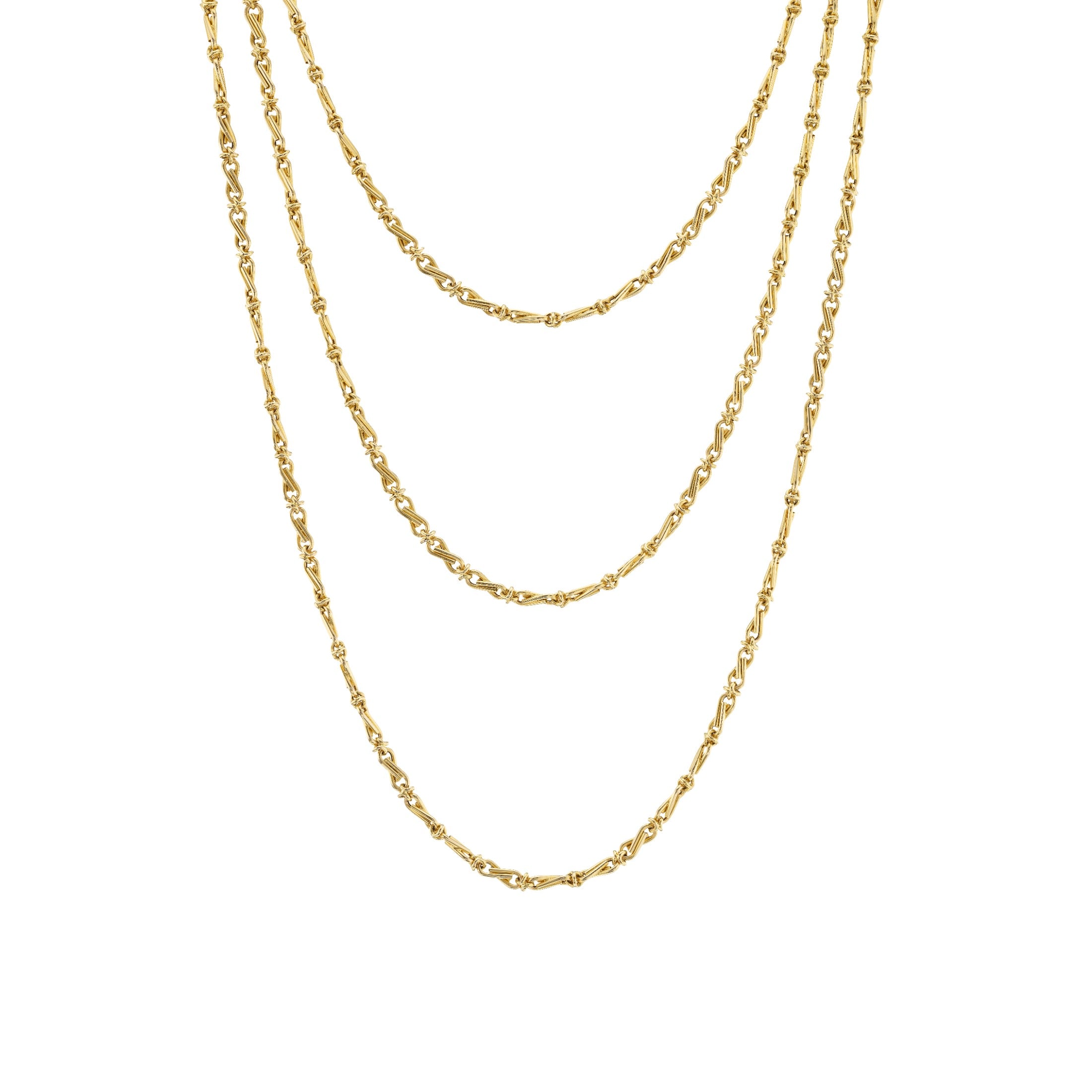 18kt yellow gold long twisted link chain necklace on white background