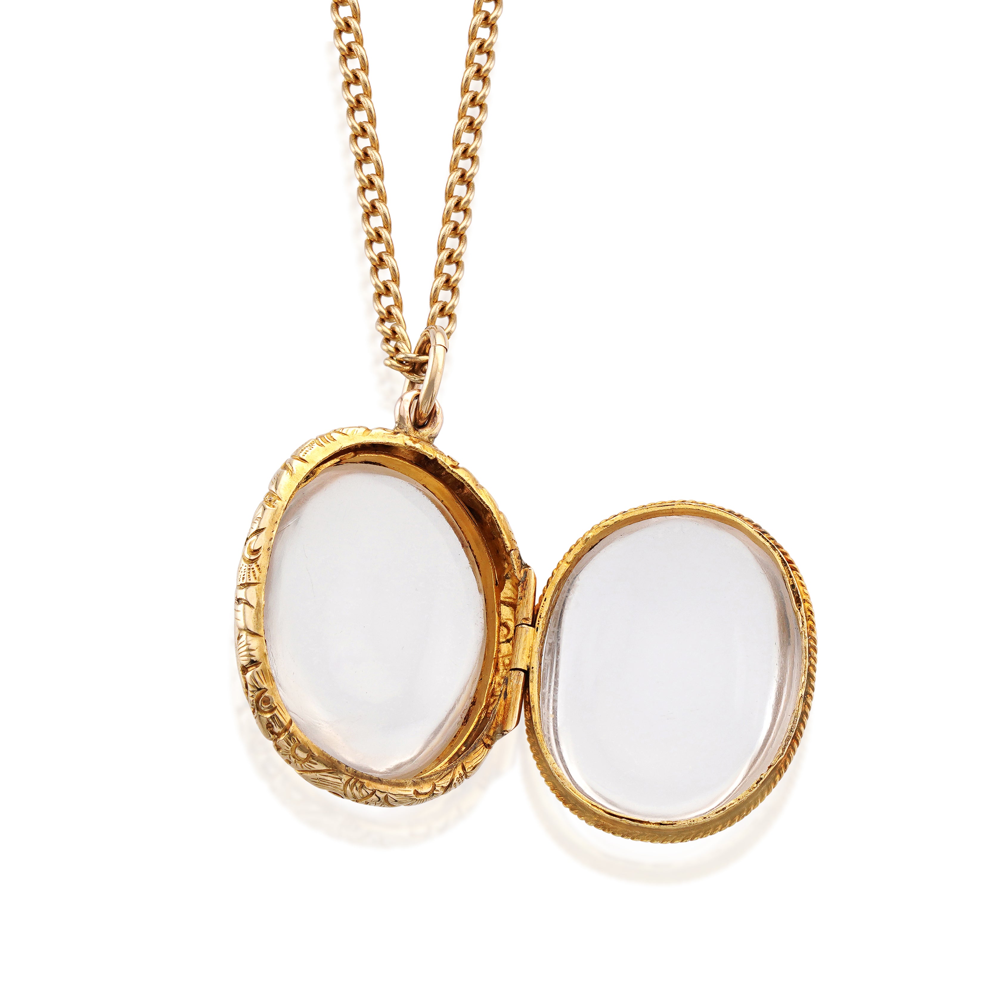 18kt Antique Gold Crystal Locket on white background, open locket
