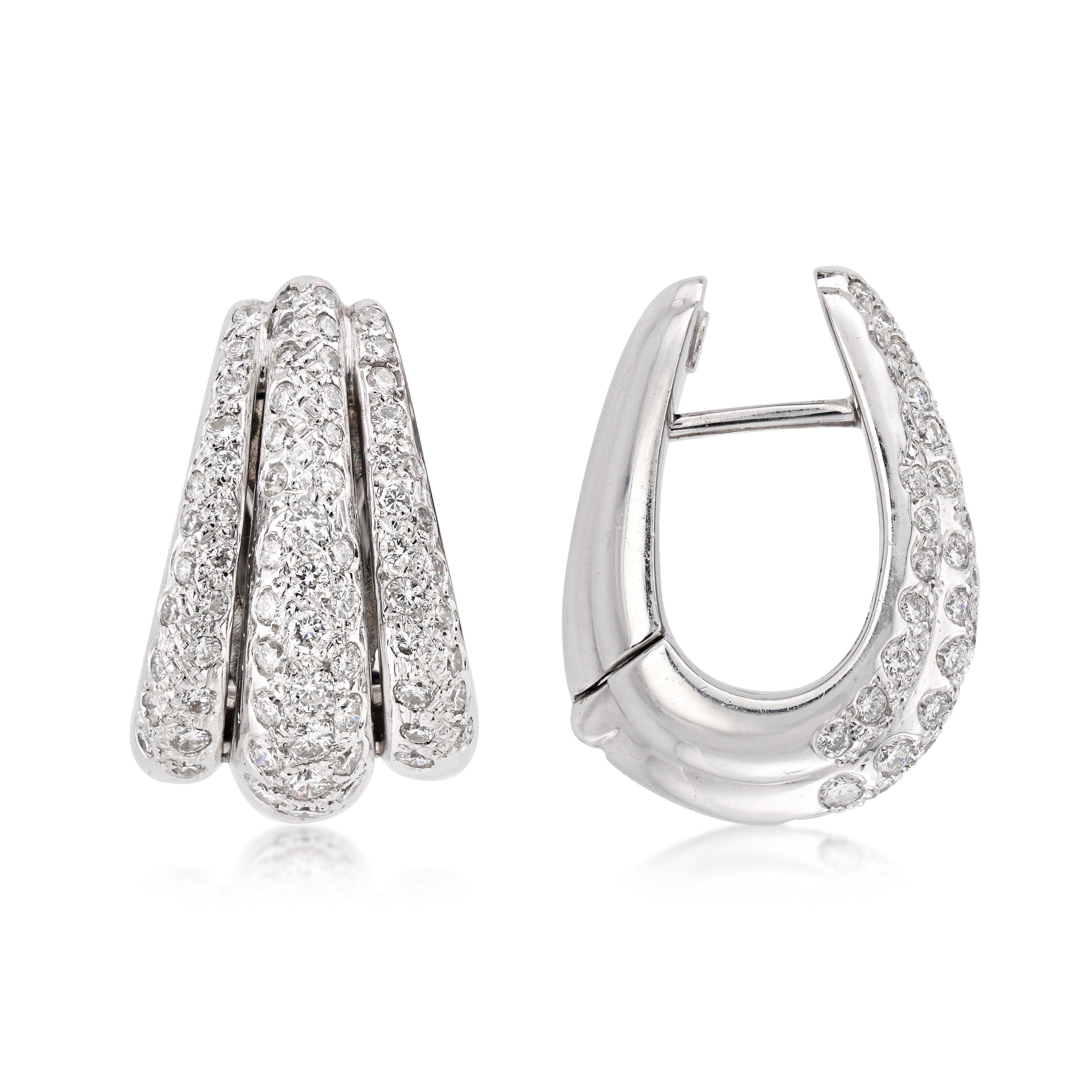 vintage 18kt white gold and diamond hoops side view on white background