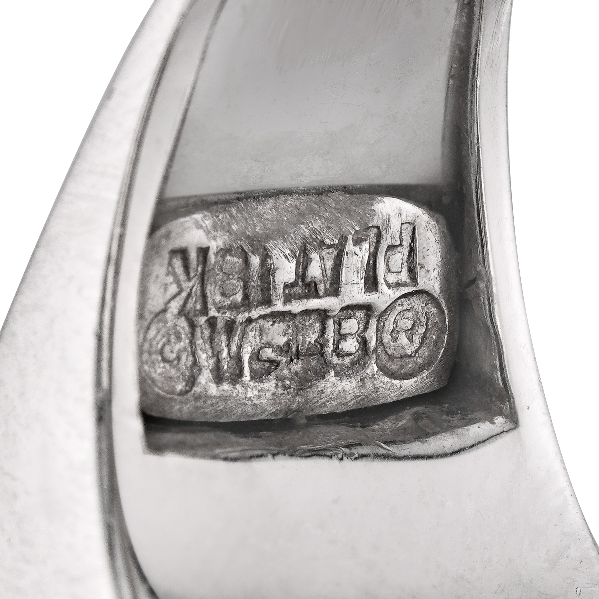 Close-up view of stamp on david webb rock crystal ring in 18kt white gold and platinum