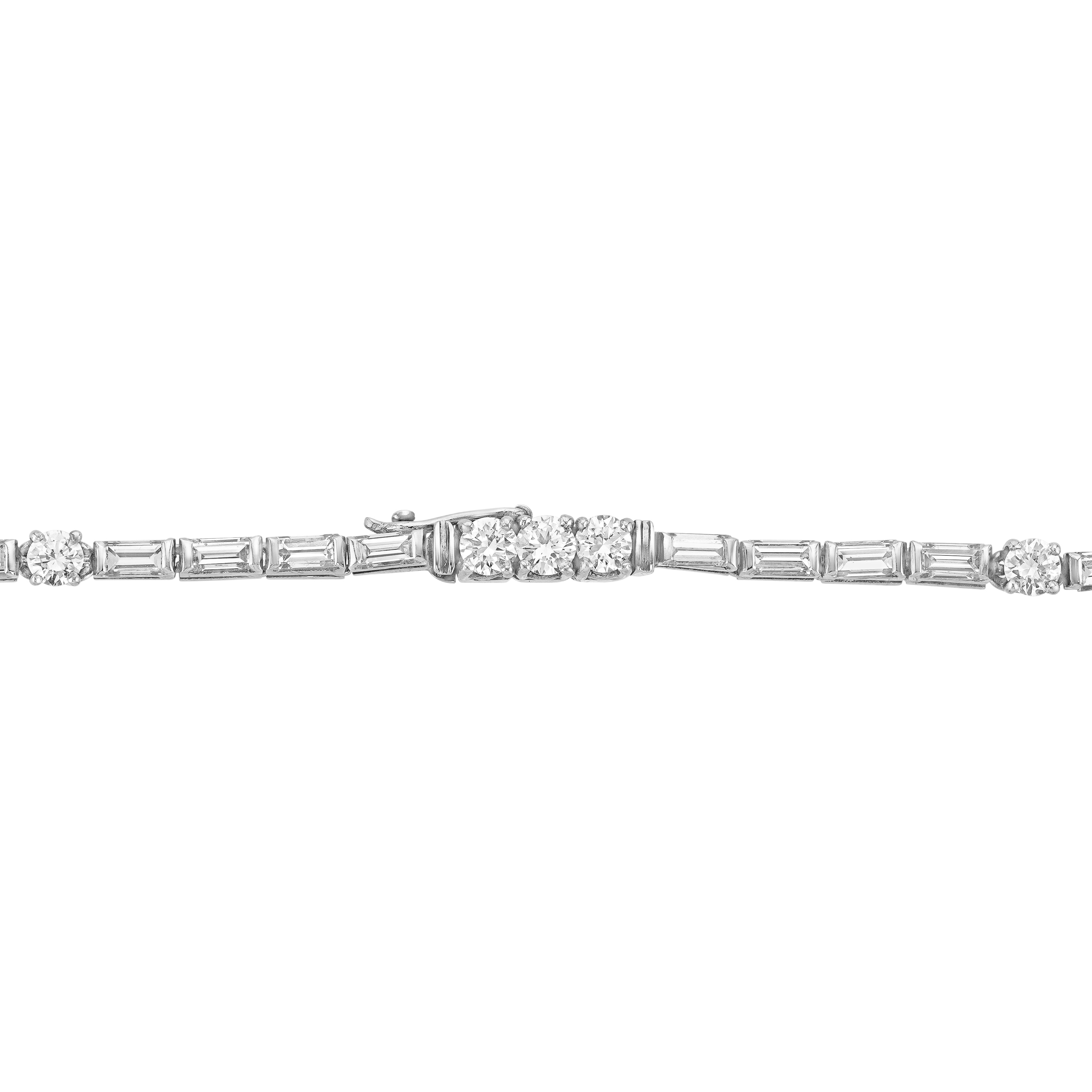 close up of clasp of vintage platinum and diamond necklace with round and baguette diamonds