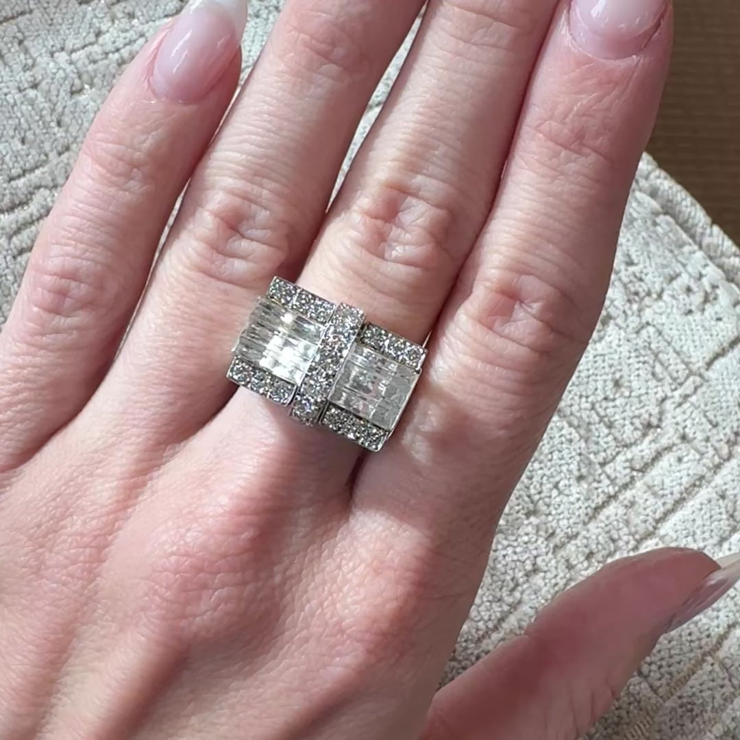 Video of woman wearing david webb rock crystal ring in white gold and platinum